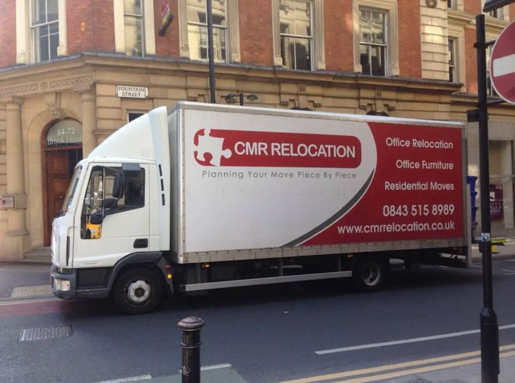 CMR Relocation lorry on Fountain Street in Manchester city centre