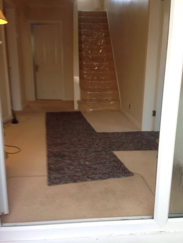 Floor runners and stair film laid by CMR Relocation before a removal